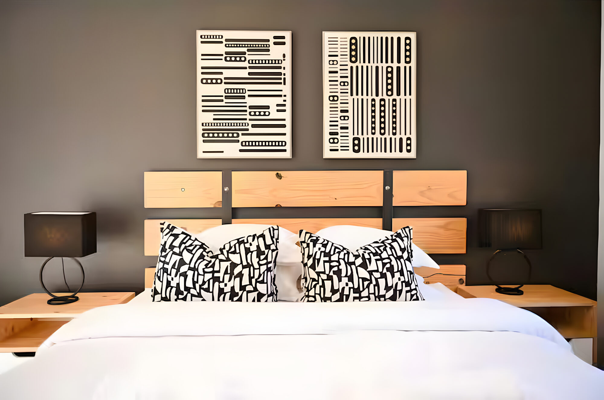 Suite One king bed with locally curated art