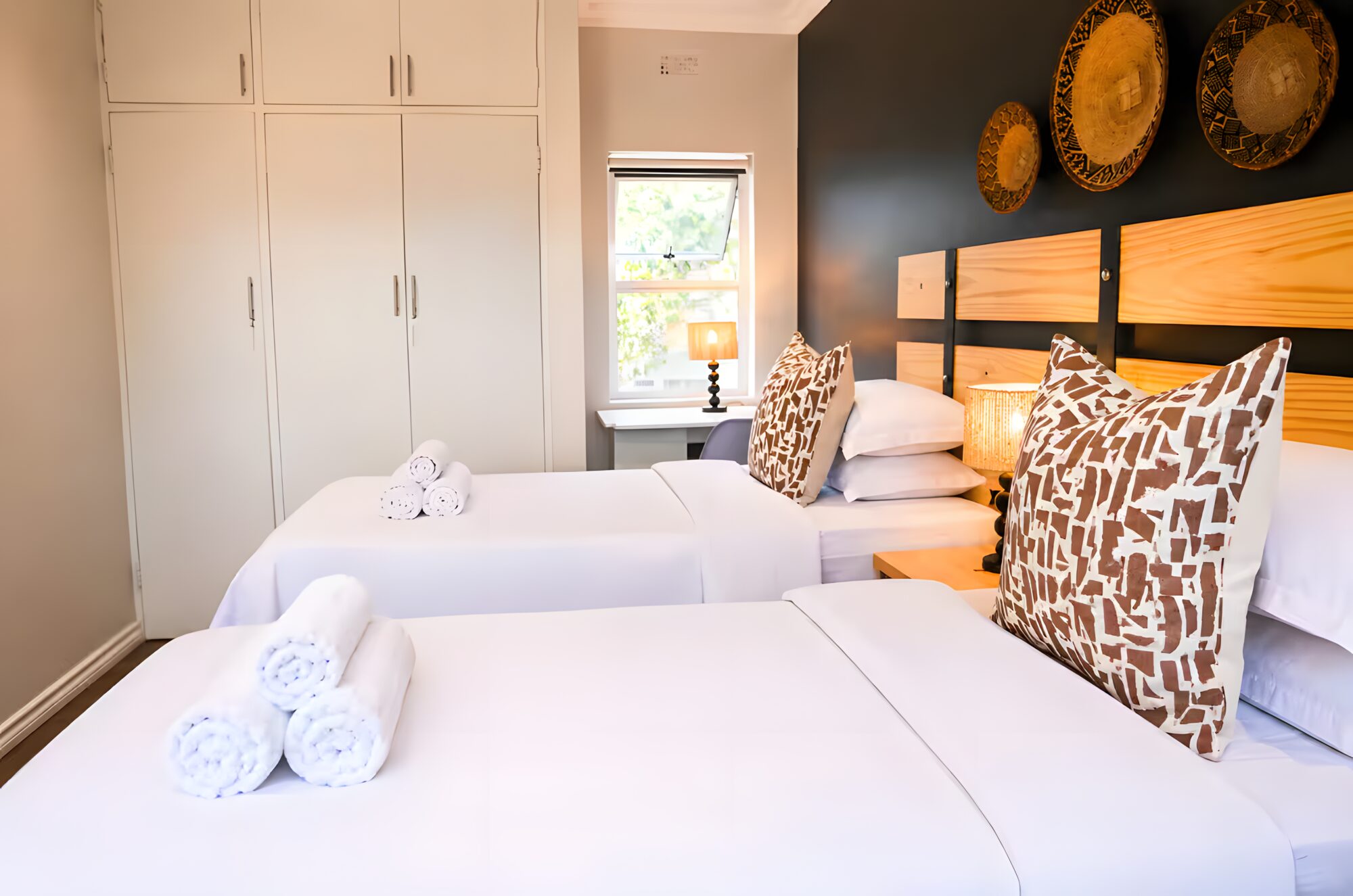 Twin bedroom with baskets